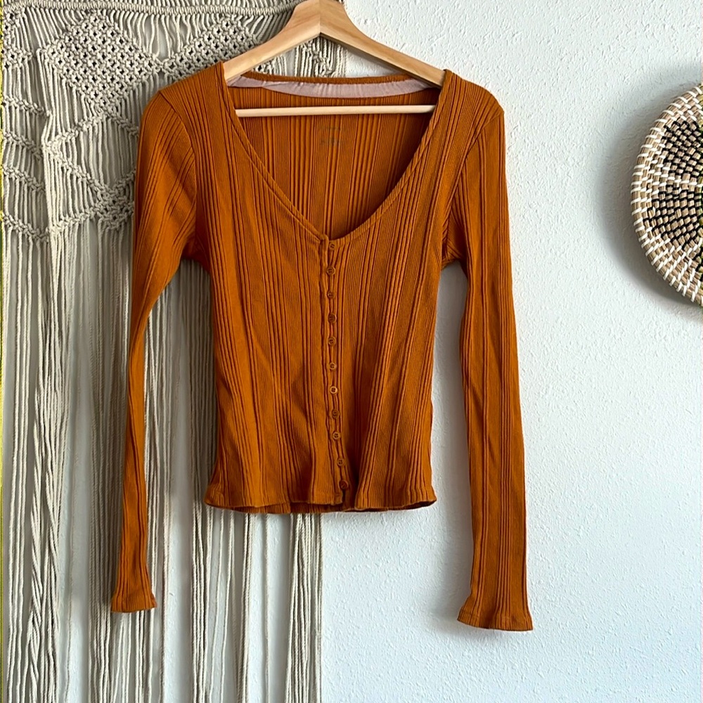 Anthropologie long sleeve ribbed cotton shirt.  Rust color.